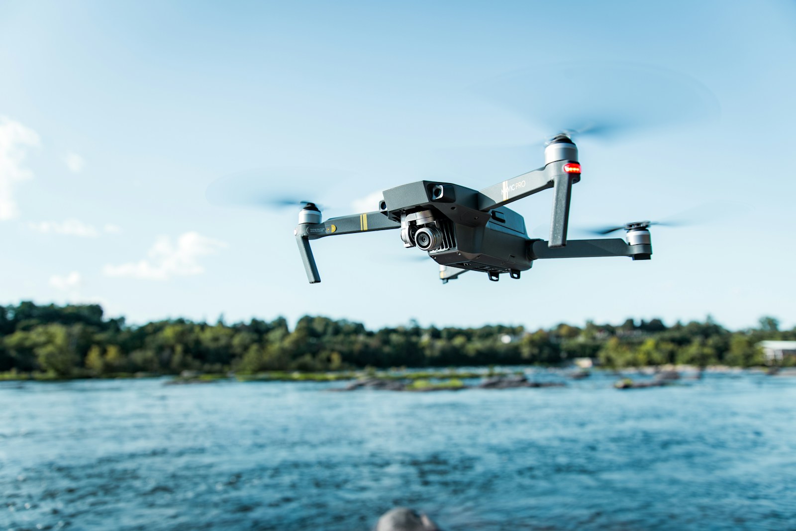 An uncrewed aircraft above the water